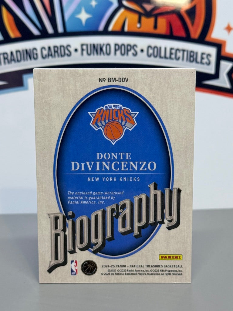2024-25 Panini National Treasures Donte DiVincenzo Biography Materials Jersey Patch /99 #BM-DDV - New York Knicks